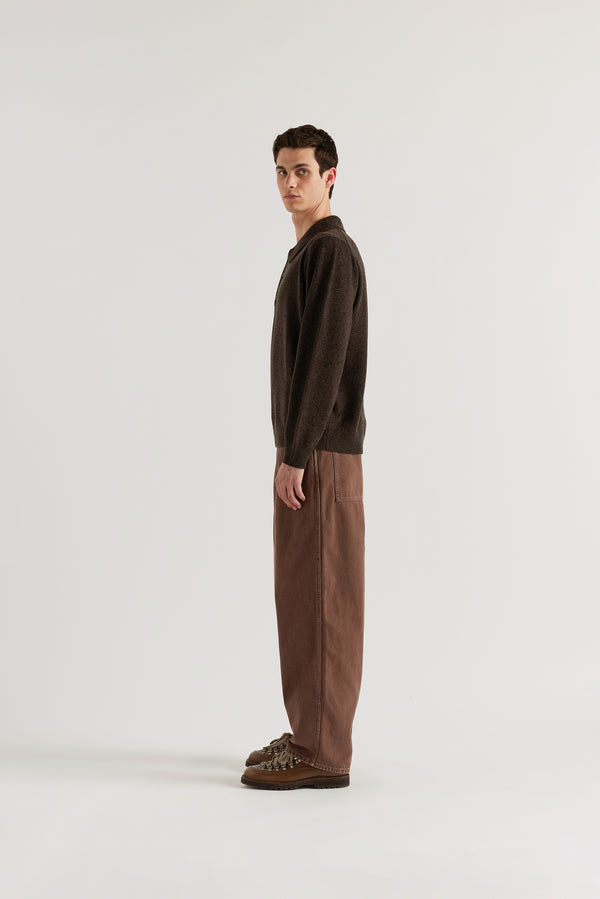 Side view of the Ash Collared Knit showing long sleeve polo silhouette, rib collar and fine extrafine Merino knit construction