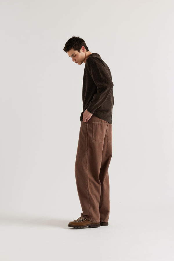 Side view of the Ash Collared Knit showing long sleeve polo silhouette, rib collar and fine extrafine Merino knit construction