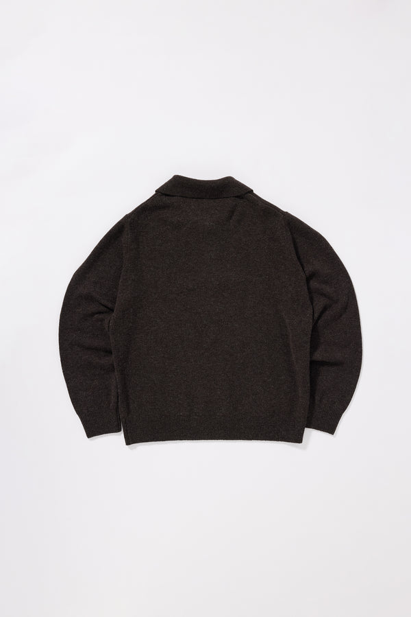 Back view of the Ash Collared Knit showing clean long sleeve silhouette and extrafine RWS Merino knit construction