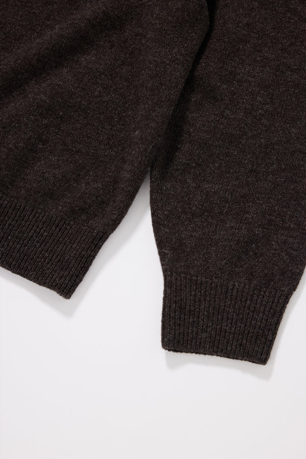 Close-up of the rib knit cuff on the Ash Collared Knit in 100% extrafine RWS certified Merino