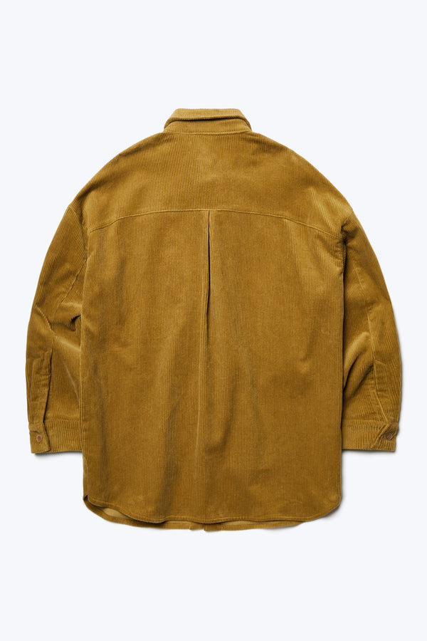 The back of the Corner Cord Shirt a loose fitting long sleeve shirt made from thick wale corduroy in Golden Tan.