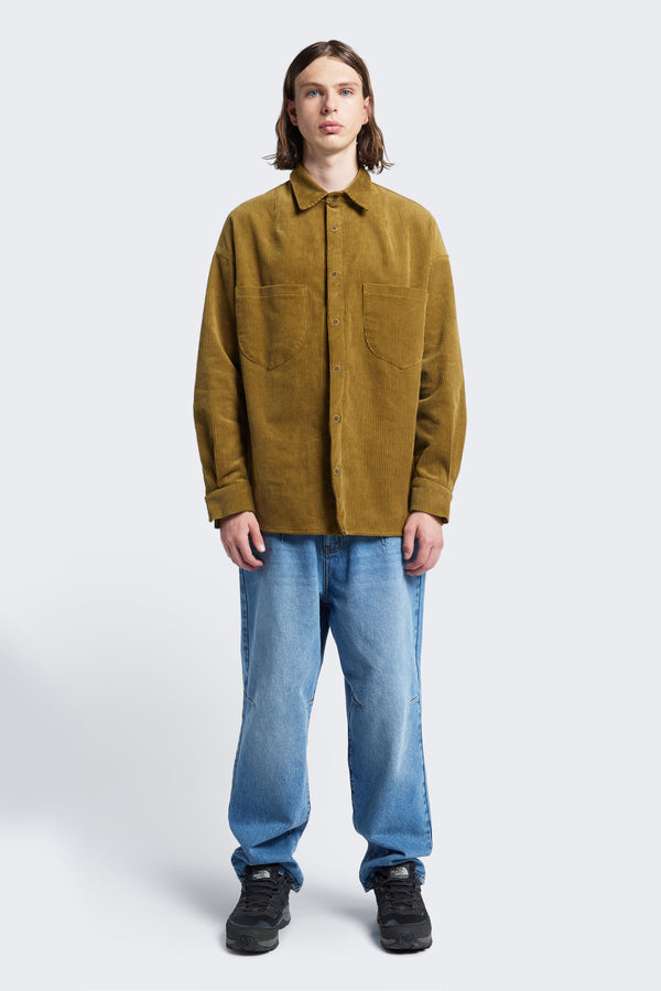 The Corner Cord Shirt a long sleeve, button up shirt with front patch pockets and made from thick-wale corduroy in Golden Tan.