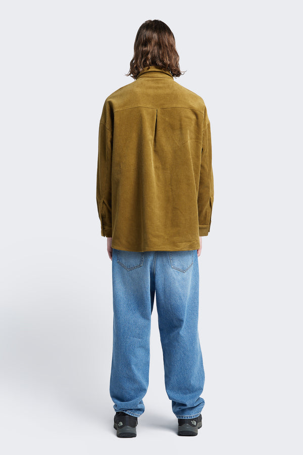 The back of the Corner Cord Shirt Golden Tan, a loose fitting long sleeve shirt made from thick-wale corduroy.