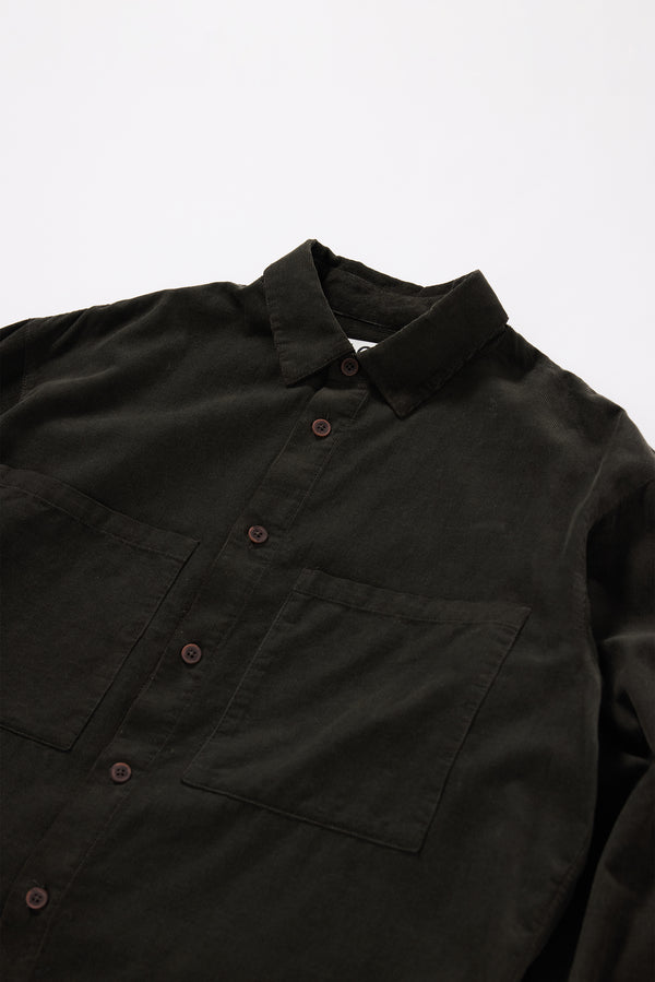 Close-up of centre-front button placket on the brown Equinox Cord Shirt in soft double over-dyed cotton corduroy