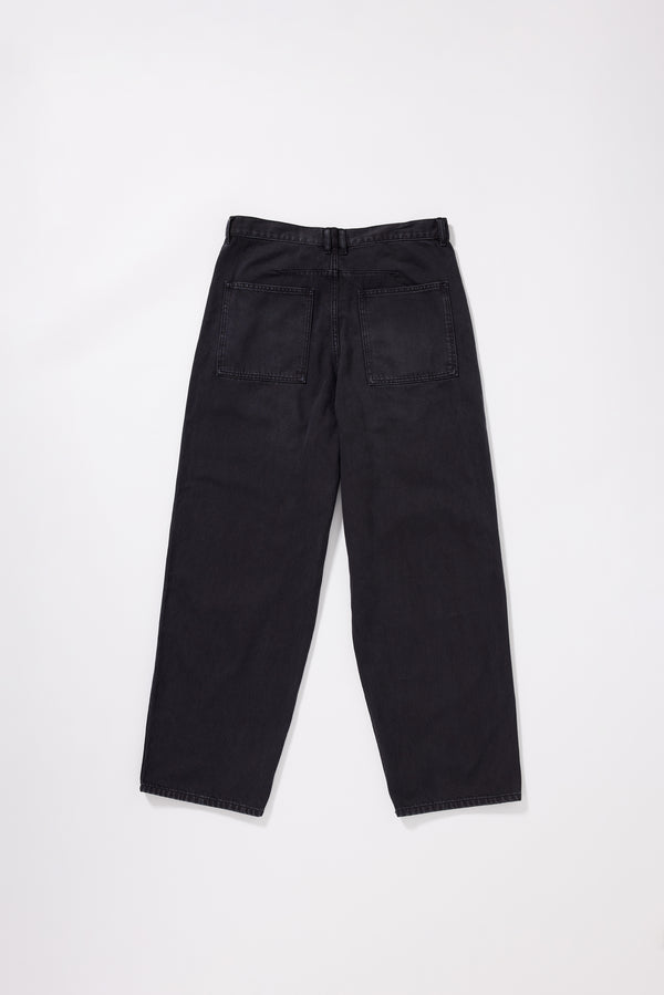Flat Back view of the Ethereal Jean in black fade featuring patch pockets and dart detailing.