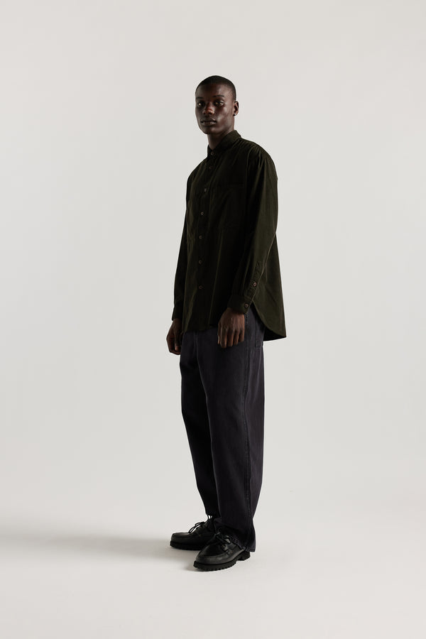 Side view of the Ethereal Jean in Black fade with a relaxed straight-leg fit, front slant pockets and oversized coin pocket.