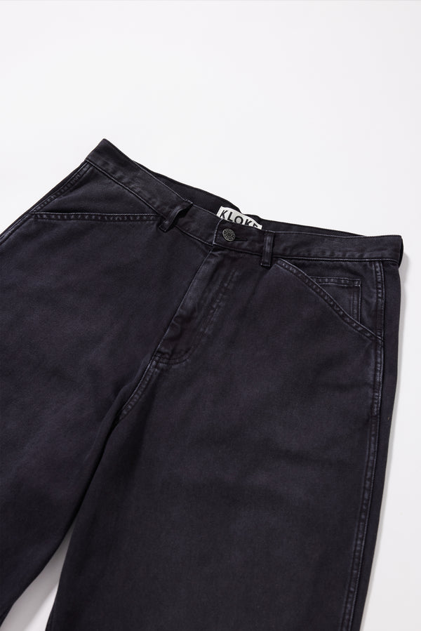 Close-up of the oversized coin pocket and twin-needle stitch detailing on the Ethereal Jean in black fade 