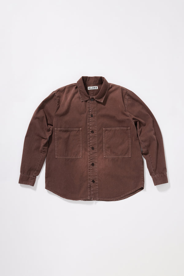 flat front of the float Oversized denim shirt in 8oz brown fade denim with chest pockets, contrast stitching and a garment-dyed stone-wash finish.