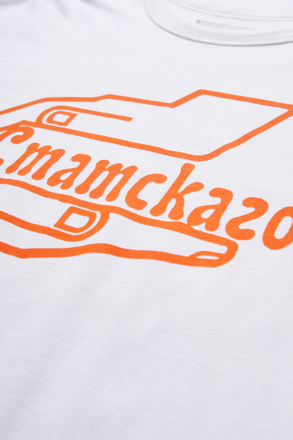 Men's white Healer Tee with the Kloke original Healer Print placement in orange. The print is the healing hands with Cmamckazo to represent the state of well-being. 