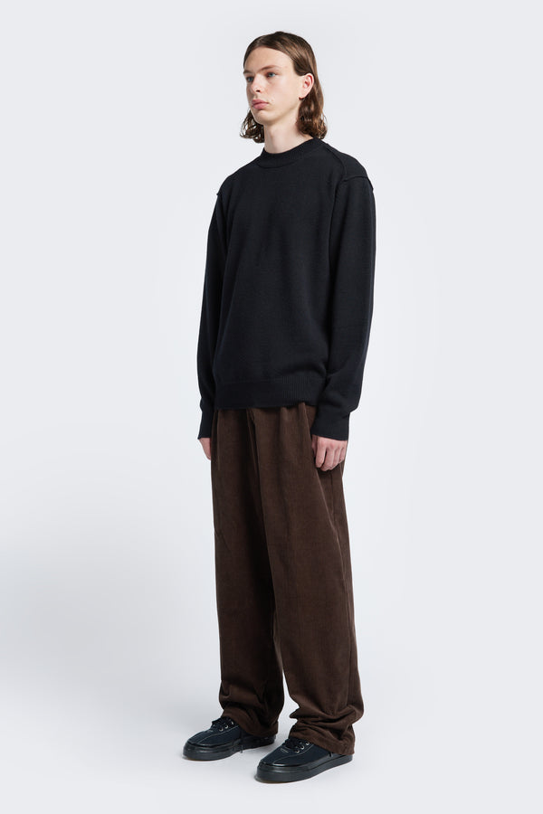 The Intake Pleat Cord Pant are a loose fit pant and a smart alternative to jeans. Featuring side slant-pockets and two button-closing back pockets.