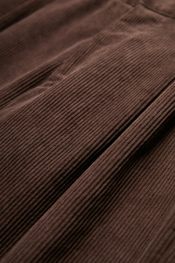 The Intake Pleat Pant cord fabric in Chocolate Brown.