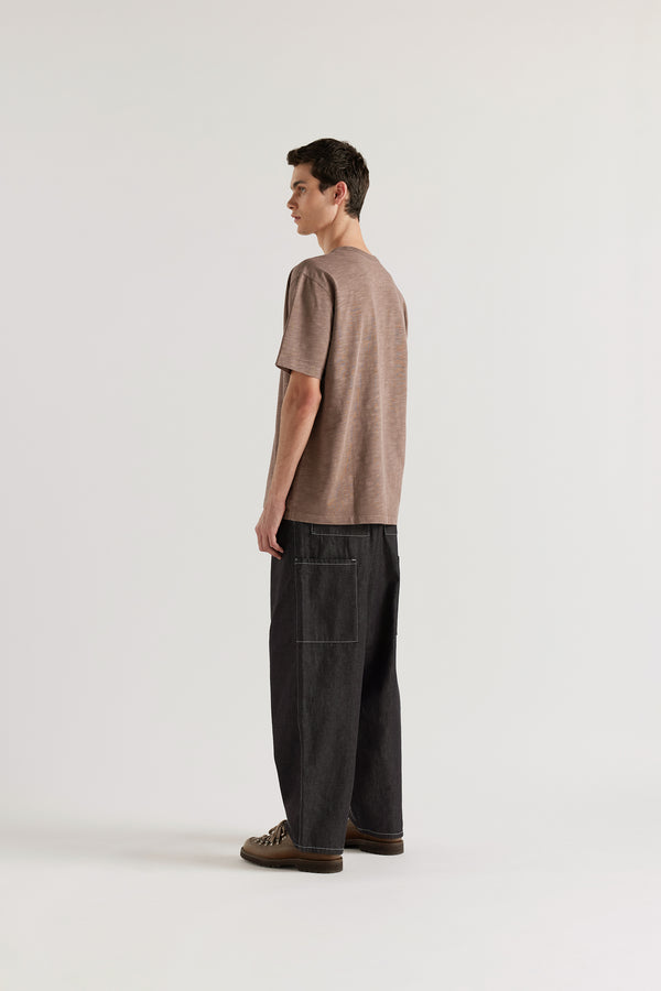 Back view of the Lull Jean featuring patch pockets and a relaxed denim silhouette.