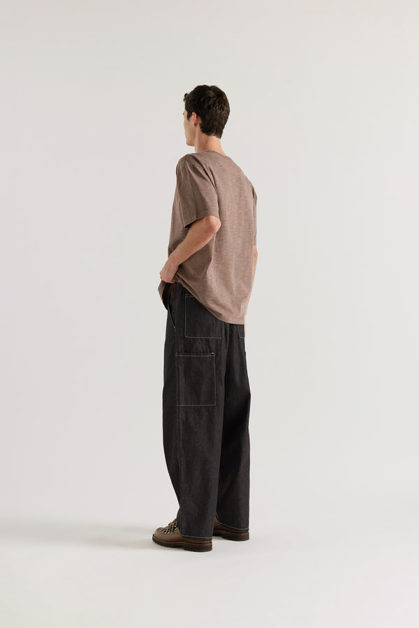 Back view of the Lull Jean featuring patch pockets and a relaxed denim silhouette.