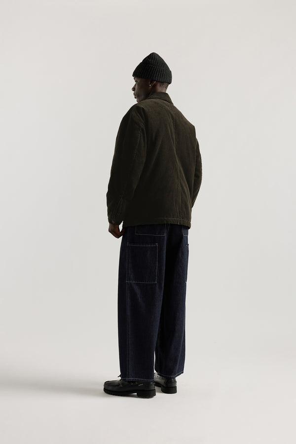 Back view of the Lull Jean featuring patch pockets and a relaxed denim silhouette.