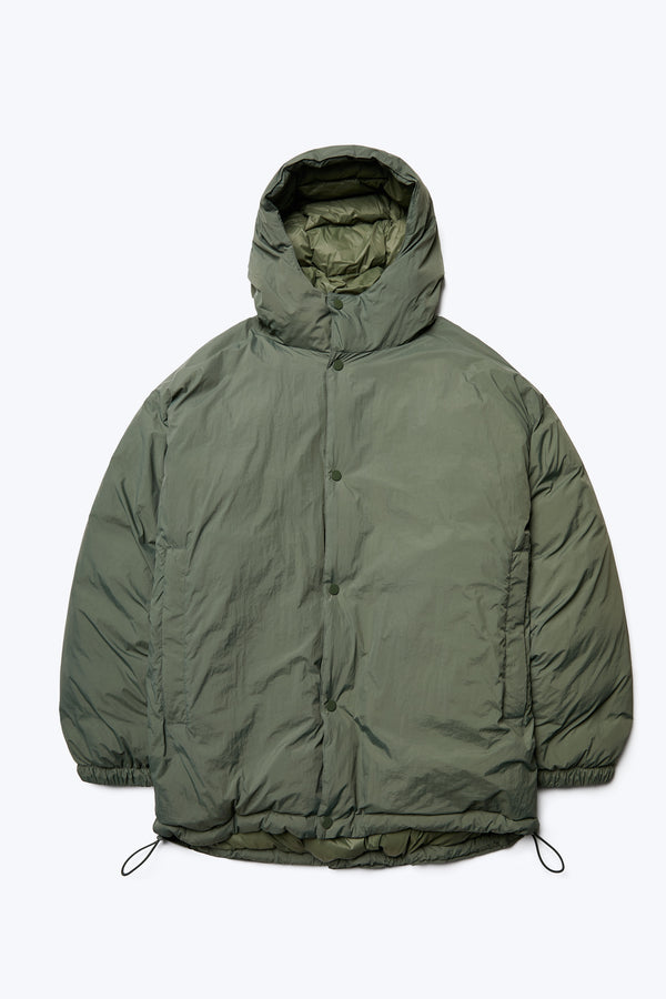 The Majority Quilted Jacket is built for the winter. Made with 100% post-consumer down fill and 100% recycled nylon, this puffer jacket in Olive Green has a fully quilted hood, an internal breast pocket with press-stud closure and side pockets with zip closure.