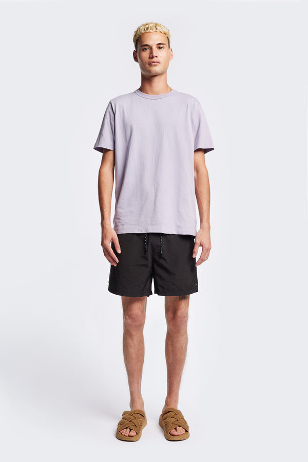 The Radius T-Shirt is a traditional men's tee with 1 x 1 rib-bound cover-stitched neckline that's reinforced at the back. Made from 100% organic cotton in Lilac Purple.