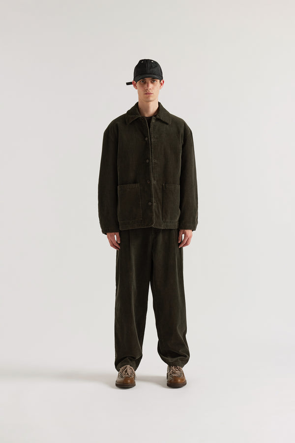Reverie Cord Jacket in Brown worn open, showing classic husky silhouette, front patch pockets and double over-dyed cotton corduroy shell