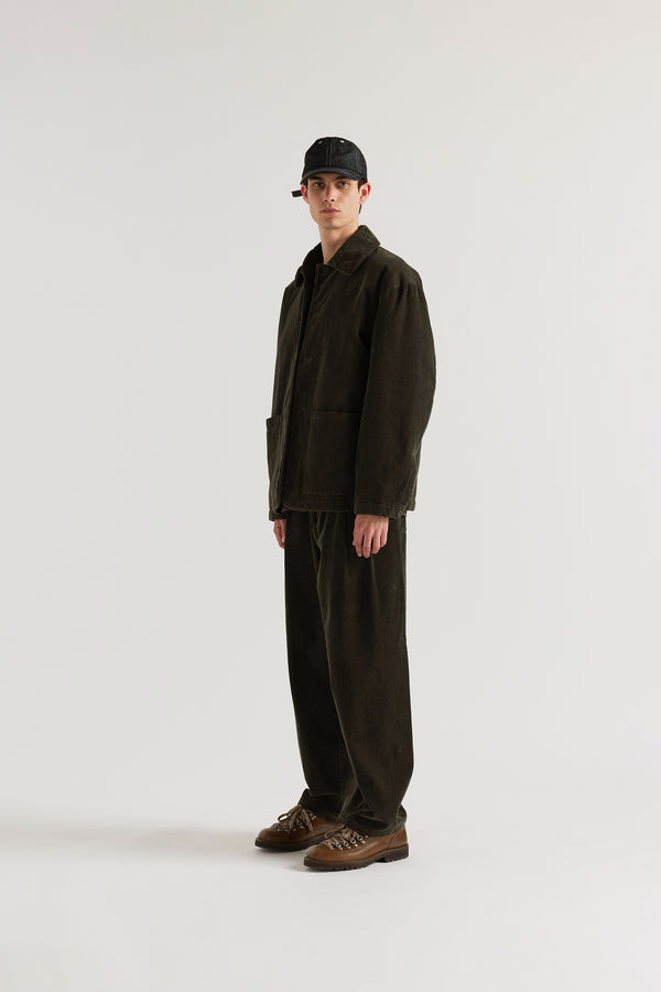 Three-quarter view of the Reverie Cord Jacket in Brown showing husky silhouette, patch pockets and double over-dyed cotton corduroy in deep brown