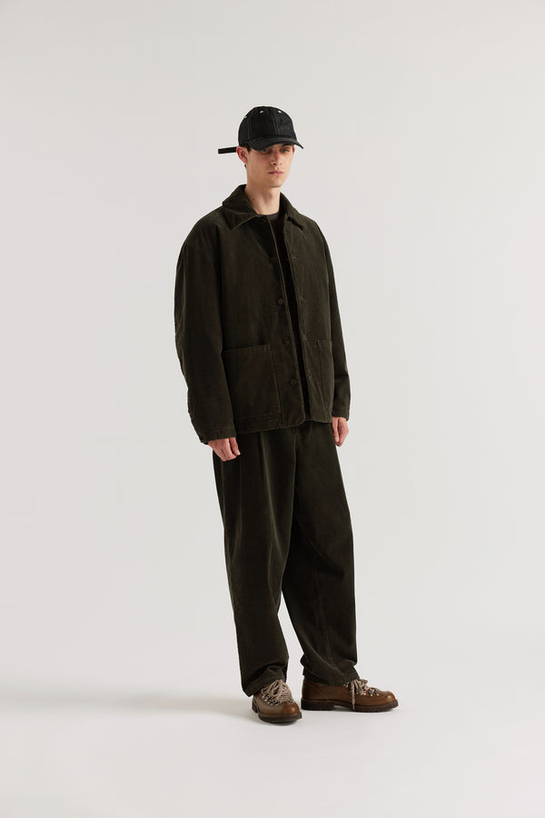 Three-quarter view of the Reverie Cord Jacket in Brown showing husky silhouette, patch pockets and double over-dyed cotton corduroy in deep brown