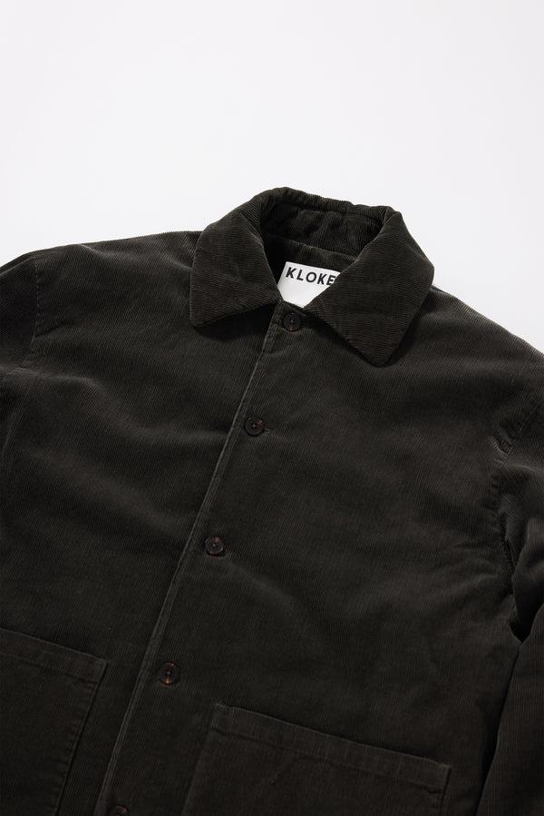 Close-up of cotton corduroy texture on the Reverie Cord Jacket in Brown showing rich depth of colour from garment double over-dye process