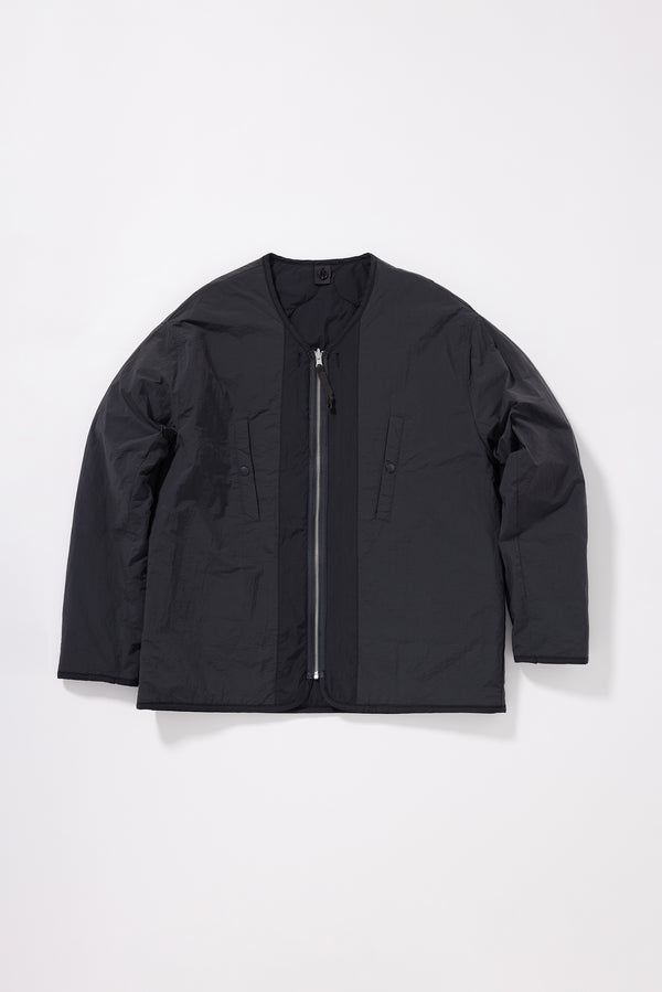 Flat front of the plain-side out, showing a clean minimalist finish with accessible pocket detail
