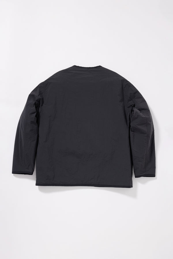 Flat back of the plain-side out, showing a clean minimalist finish with accessible pocket detail