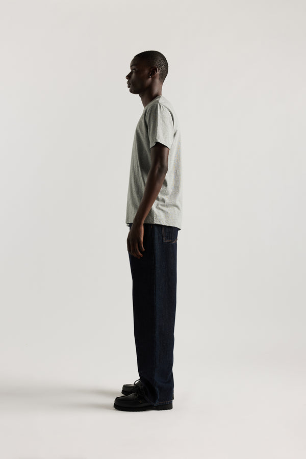 The sworn denim jean in Indigo. Looser fit all-purpose jeans in premium Japanese denim with zip fly, button closure, five-pocket design, and Kloke branded hardware. Available in 8 sizes.