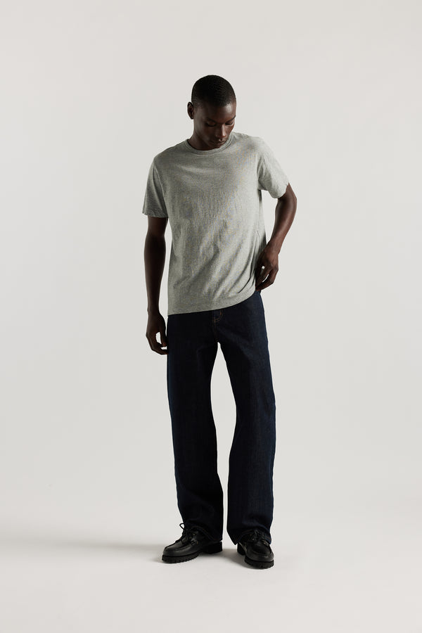 The sworn denim jean in Indigo. Looser fit all-purpose jeans in premium Japanese denim with zip fly, button closure, five-pocket design, and Kloke branded hardware. Available in 8 sizes.