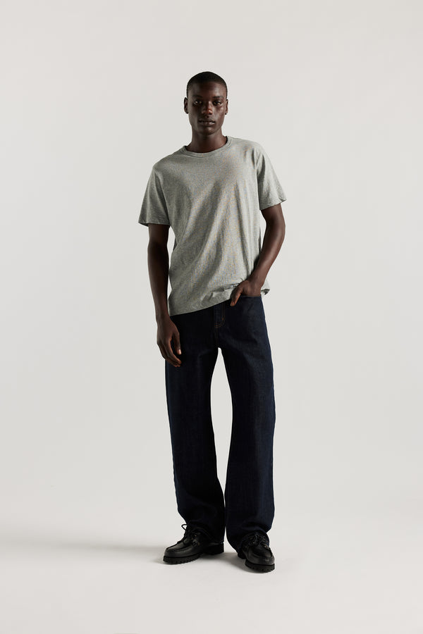The sworn denim jean in Indigo. Looser fit all-purpose jeans in premium Japanese denim with zip fly, button closure, five-pocket design, and Kloke branded hardware. Available in 8 sizes.