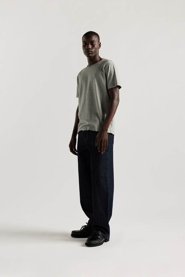 The sworn denim jean in Indigo. Looser fit all-purpose jeans in premium Japanese denim with zip fly, button closure, five-pocket design, and Kloke branded hardware. Available in 8 sizes.
