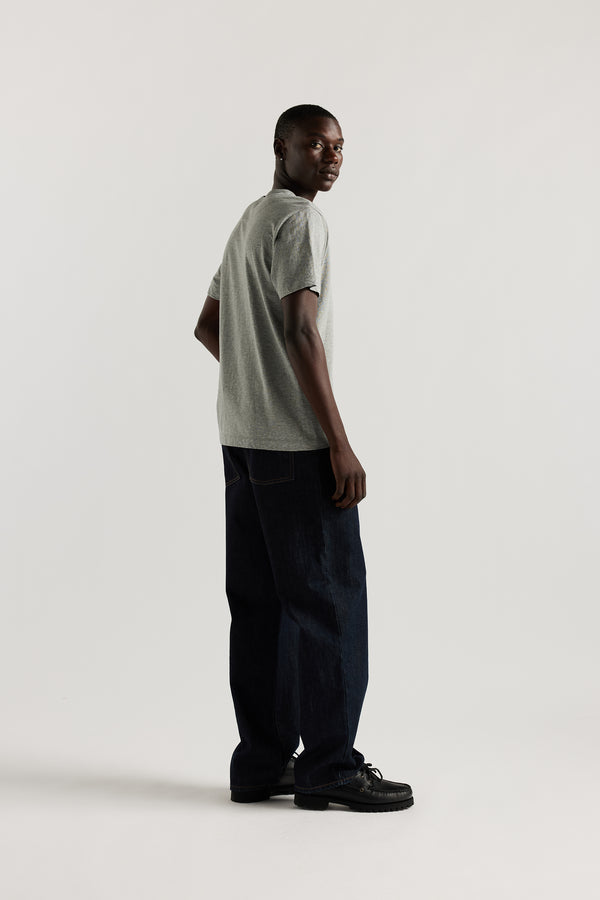 The sworn denim jean in Indigo. Looser fit all-purpose jeans in premium Japanese denim with zip fly, button closure, five-pocket design, and Kloke branded hardware. Available in 8 sizes.