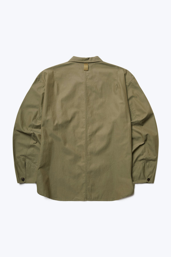 The back of the Territory Overshirt Olive, a military-inspired overshirt. The shirt has shaped cuffs with button closure and webbing detail at the back of neck. Made from a mid-weight cotton drill.