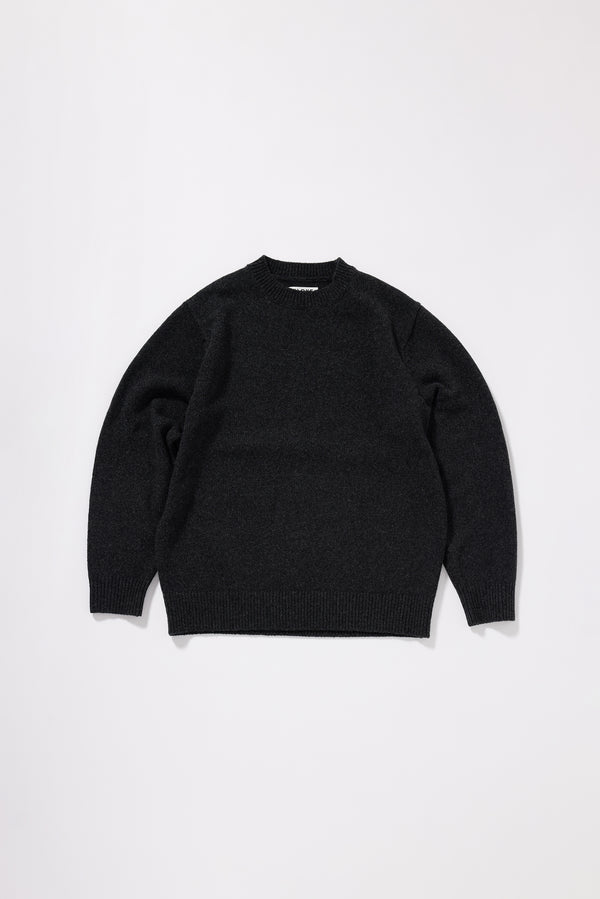 Charcoal Vellum Knit Sweater front view showing clean crew neck silhouette and minimal extrafine RWS Merino knit construction