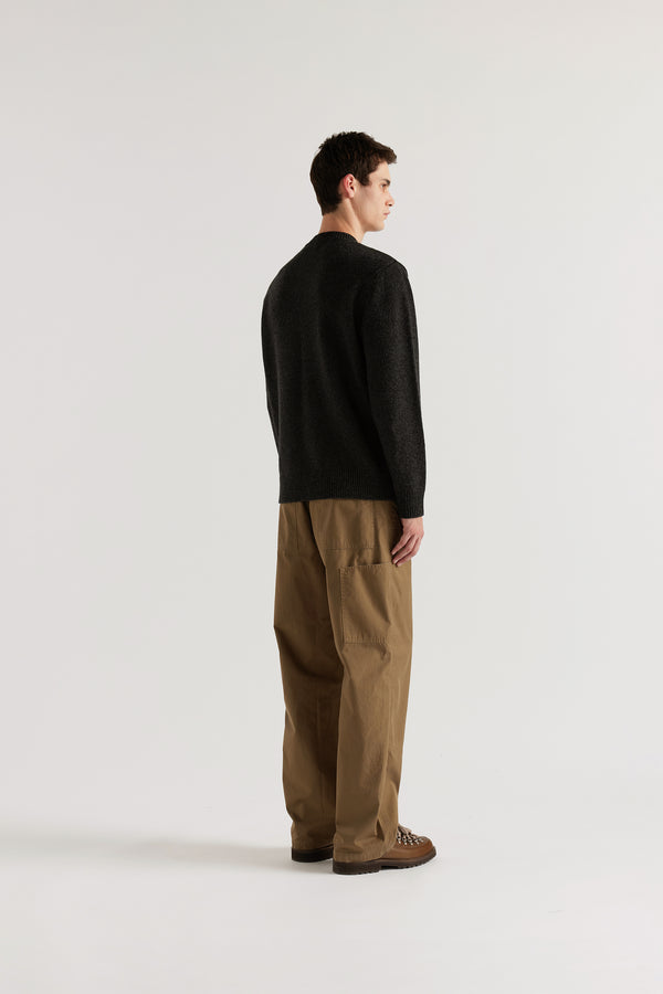 Back view of the Charcoal Vellum Knit Sweater showing classic crew neck silhouette in 100% extrafine RWS certified Merino