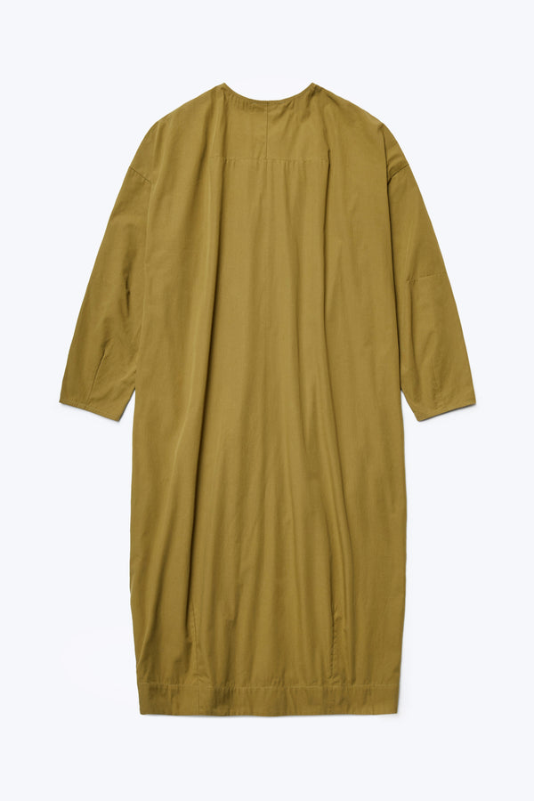 The back of the Agora Dress Moss Green, a boxy style dress with darted detailing across the back.