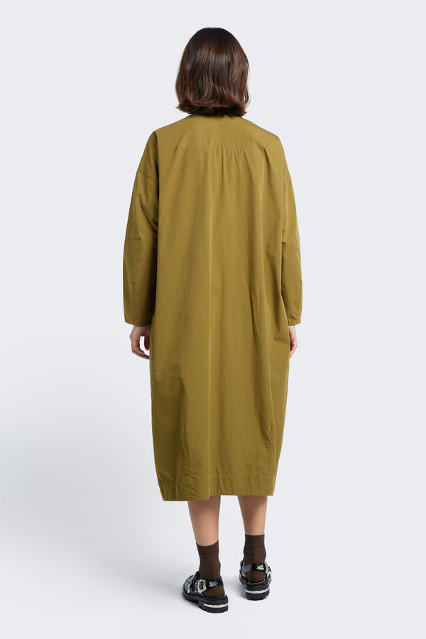 The back the Agora Dress Moss Green with darted detailing along the back and long sleeves