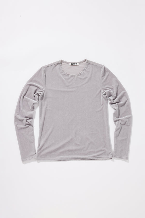 Course Top in Silver. Slim fit velour top laid flat front up, showing shape and fabric.