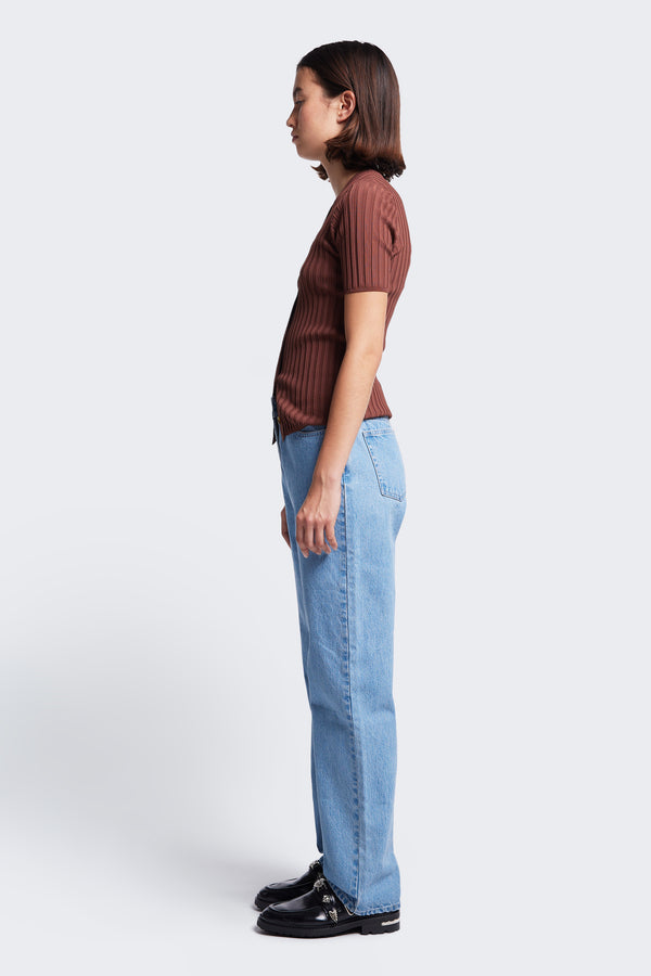 Side profile of the Delay Short Sleeve Knit Cocoa a slim fit, short sleeve V neck button knit that is soft against the skin. 