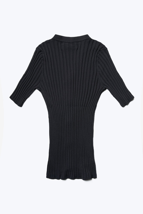 Flat lay of the back of the Delay Short Sleeve Knit Ink has rib textured detail and is made from 80% Viscose, 20% Nylon.