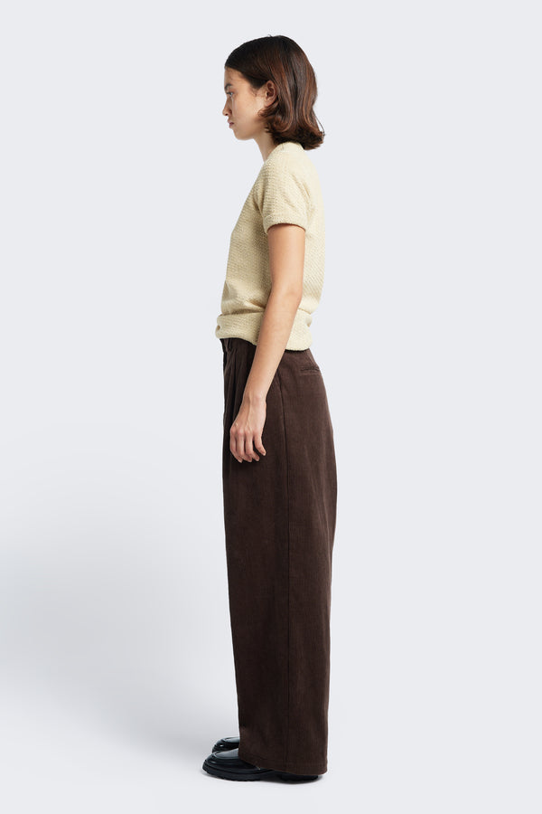 Side profile of the Exodus Tee Butter, a short sleeve, classic slim fit ringer t-shirt in thick jersey.