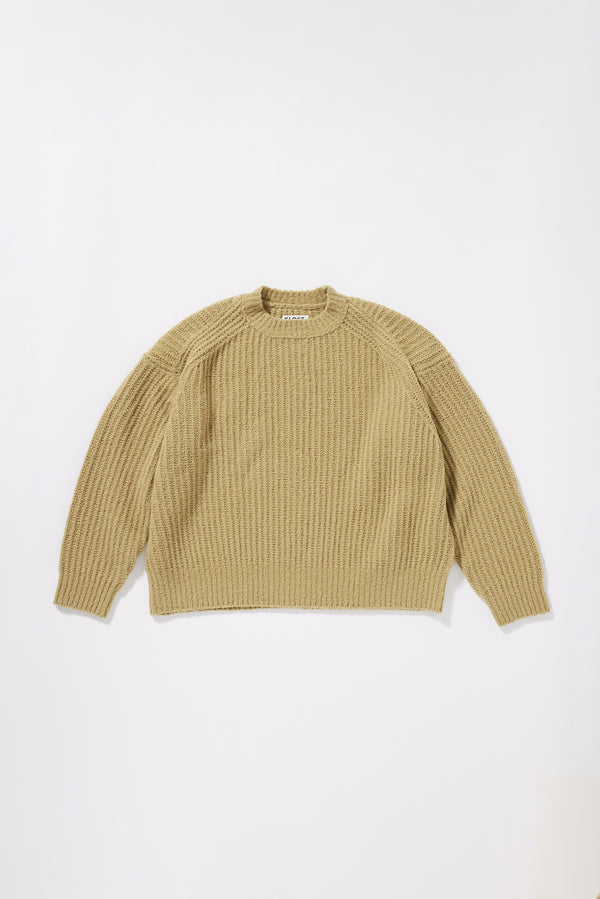 chartreuse Flutter Sweater front view showing chunky reverse half-cardigan rib knit construction, dropped shoulders and relaxed raglan sleeve silhouette