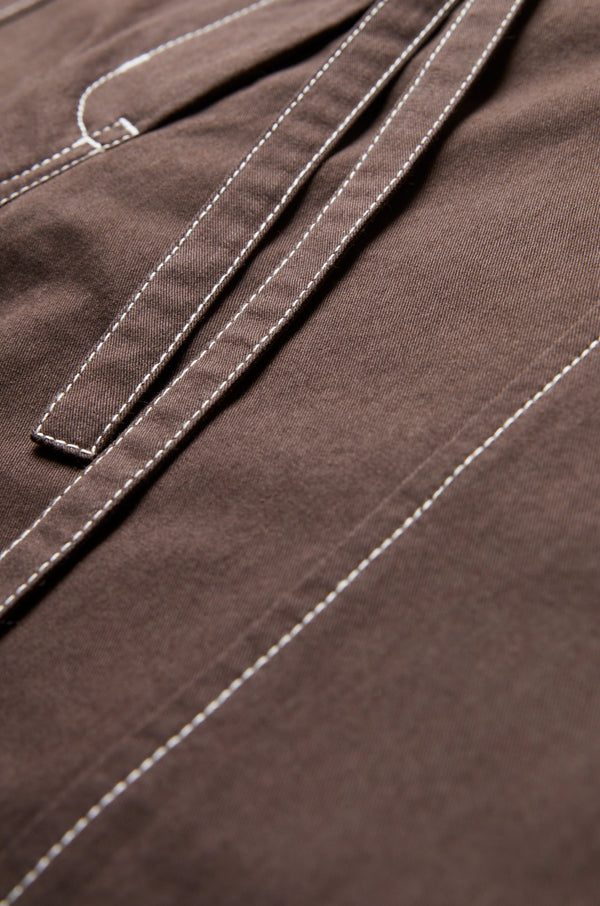 Close up of the white contrast stitching on the Found Tie Front Pant Brown. 