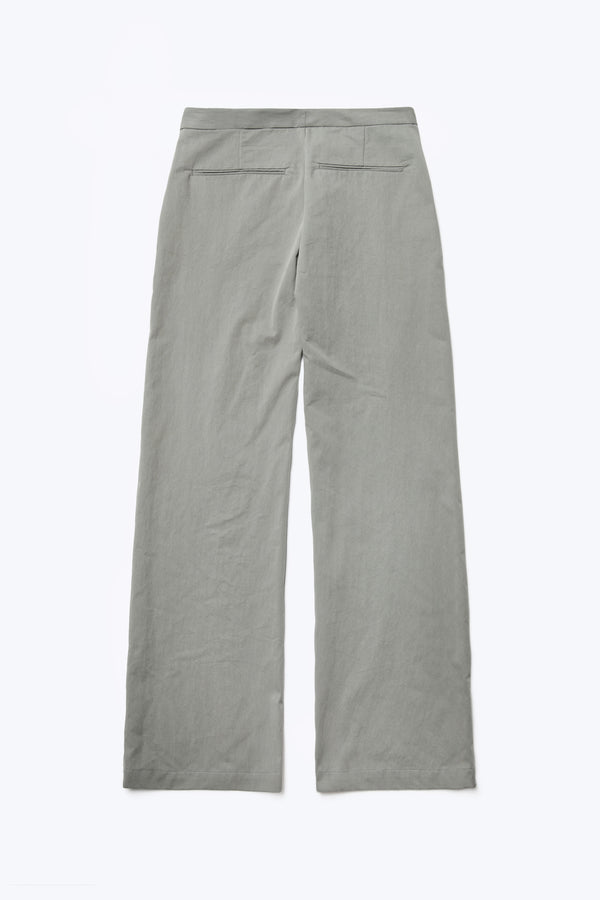 The back of the Grace Pant Grey, a slim, straight leg pant with mid-rise waistline. Crafted from a transcendent linen-cotton blend and finished with tailored welt pockets at the rear.