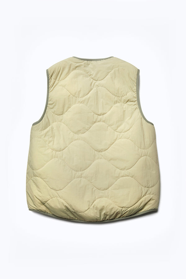 The Back of the Hearth Shearling Vest with the reverse in a recycled nylon in Sand. 