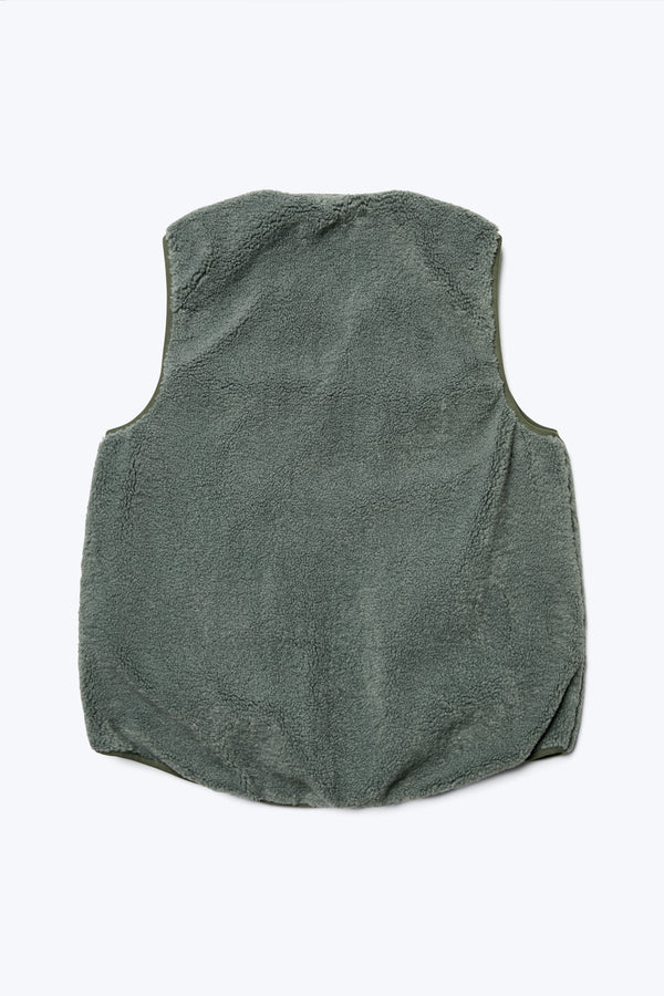 The Back of the Hearth Shearling Vest with the warming faux shearling fabrication in Petrol Green.