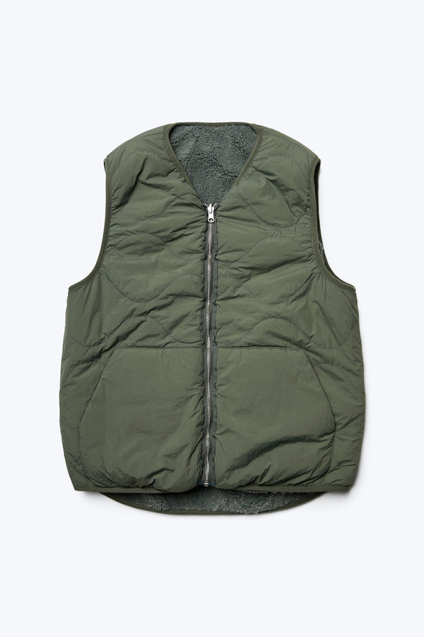 The Hearth Shearling Vest with the reverse in a recycled nylon in Petrol Green with centre front zip closure. 