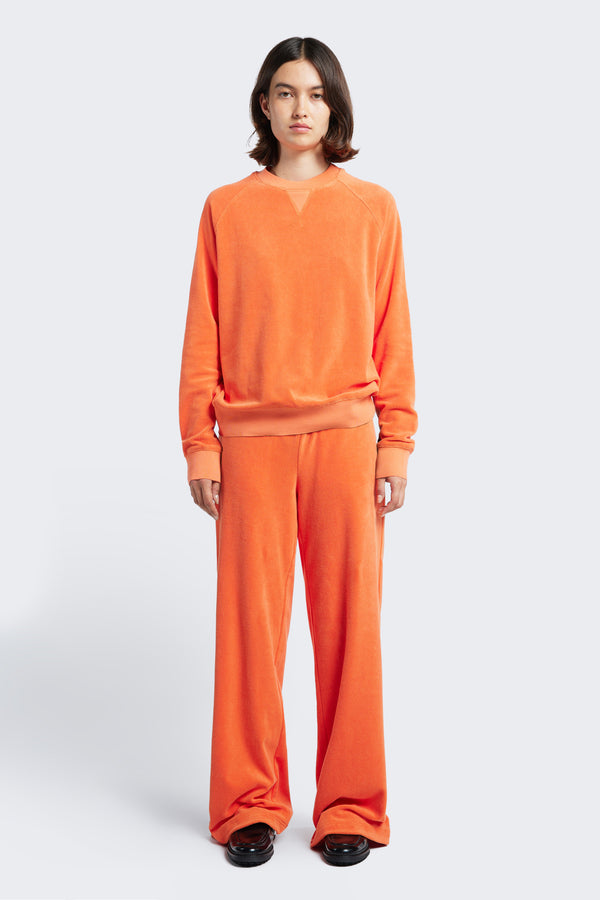 The Hero Towelling Sweater made from plush, 100% cotton Okeo-tex standard 100 micro terry-towelling in Tangerine Orange. Styled with the Prone Towelling Track Pant Tangerine for head to toe impact.