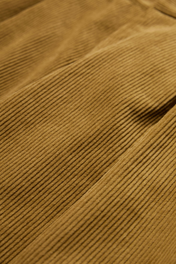 The Interim Pant Corduroy fabric in Golden Tan.