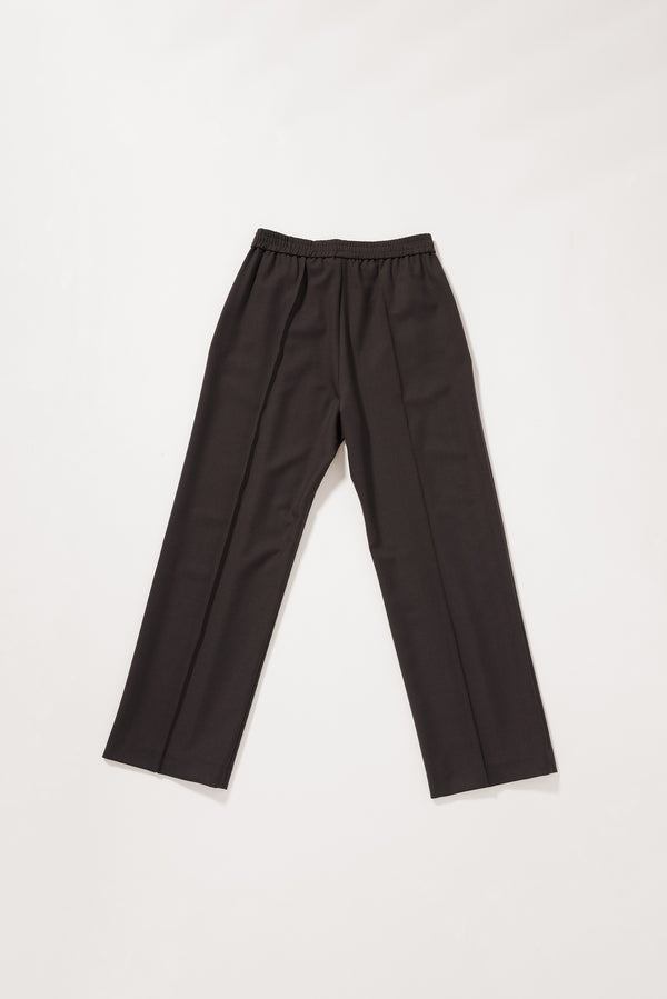 Flat Back view of the Dark Taupe Manta Pant showing the clean tailored fit and elasticated waistband.