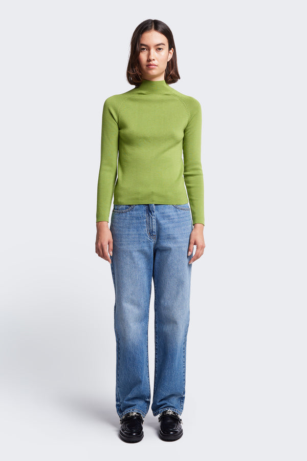 The Monument Mock Neck Sweater is a slim fit knit with a high neck and a 1 x 1 Rib Stitch. Knitted in a merino wool in bright Apple Green. Available in five sizes. 